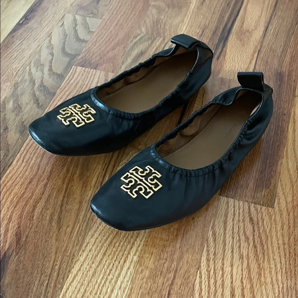 Tory Burch Black Flats with Gold Emblem - Picture 2 of 4